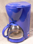 A blue Alaska brand drip coffeemaker.